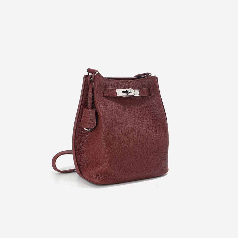 Classic red leather handbag bucket bag with a silver clasp
